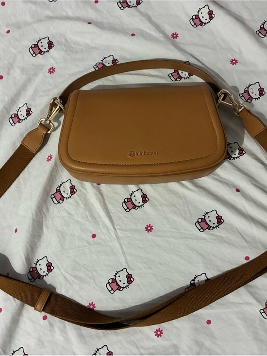 lululemon athletica Handbags - lululemon athletica Tan Leather-Look Crossbody Bag with Gold Hardware